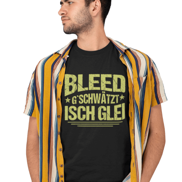 mann im studio mit hemd und schwarzem t-shirt mit motiv badisch bleed gschwaetzt