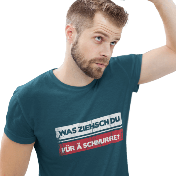 mann im studio mit bart und blauem shirt mit was ziehsch du fuer ae schnurre bildmotiv