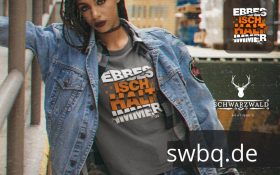 frau mit jacke und grauem shirt mit alemannischem spruch