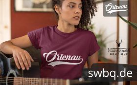 frau mit guitarre und lila tshirt mit ortenau aufdruck