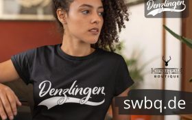 frau mit locken und schwarzem t-shirt mit logo denzlingen