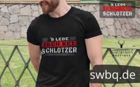 baertiger mann mit schwarzem shirt mit design slebe isch kei schlotzer