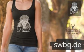 oberkoerper einer frau im wald mit schwarzem tank top mit schwarzwald braut mit bollenhut design